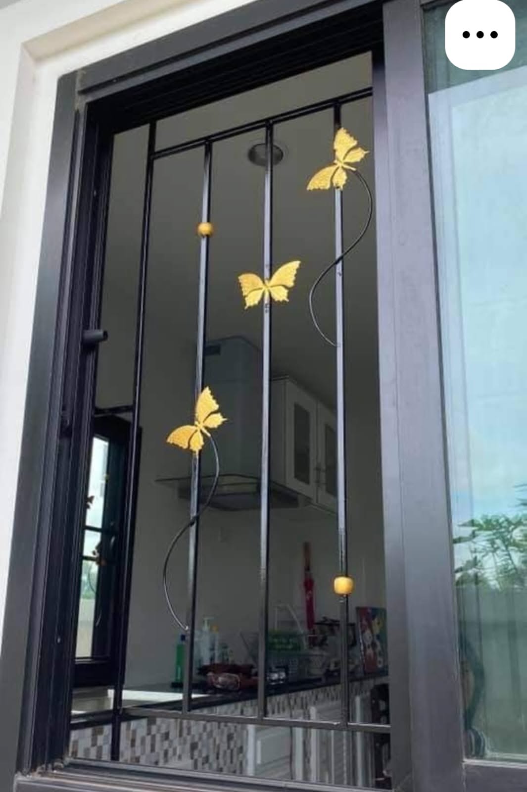 Decorative window security bars featuring butterfly designs